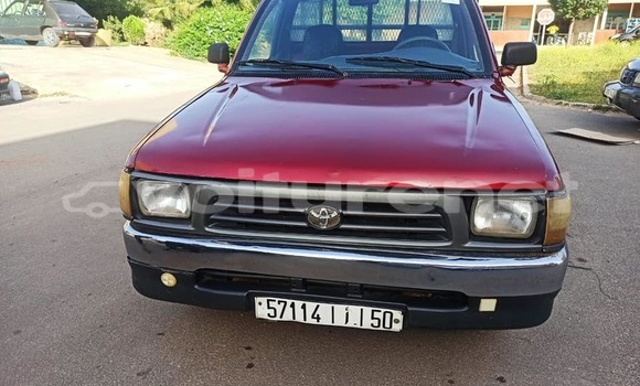 Acheter Occasion Voiture Toyota Hilux Rouge à al-Arwi, Oriental Acheter Occasion Voiture Toyota Hilux Rouge à al-Arwi, Oriental